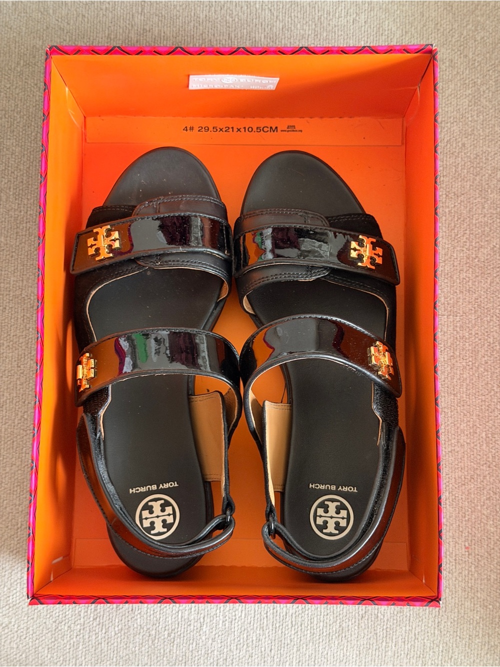 Tory Burch Kira Black Patent Double-Strap Sandals with Gold Logo Accents - Picture 2 of 10